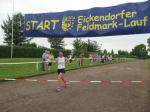 Als erste Frau über die 12 Kilometer lief Sabine Börner über die Ziellinie.